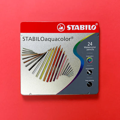 Crayon qui se transforme en aquarelle, emballage de 24 couleurs variés et vives. Offre une texte de crayon bois qui se transforme en aquarelle avec un peu d'eau. Offert sur la boutique en ligne de PICO tatouages temporaires. / Pencil that transforms into watercolor, packaging of 24 varied and vivid colors. Offers a wood pencil text that turns into watercolor with a little water. Offered on the PICO temporary tattoos online store.