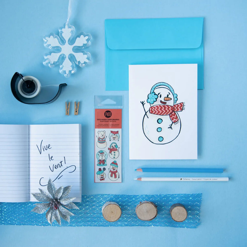 Carte de souhaits PiCO Tatoo pour Noël comprenant des tatouages temporaires de bonhommes de neige.